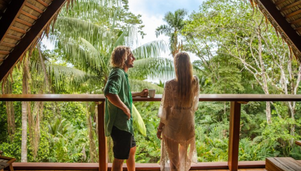 Couple enjoying the view from Casa Botanica balcony